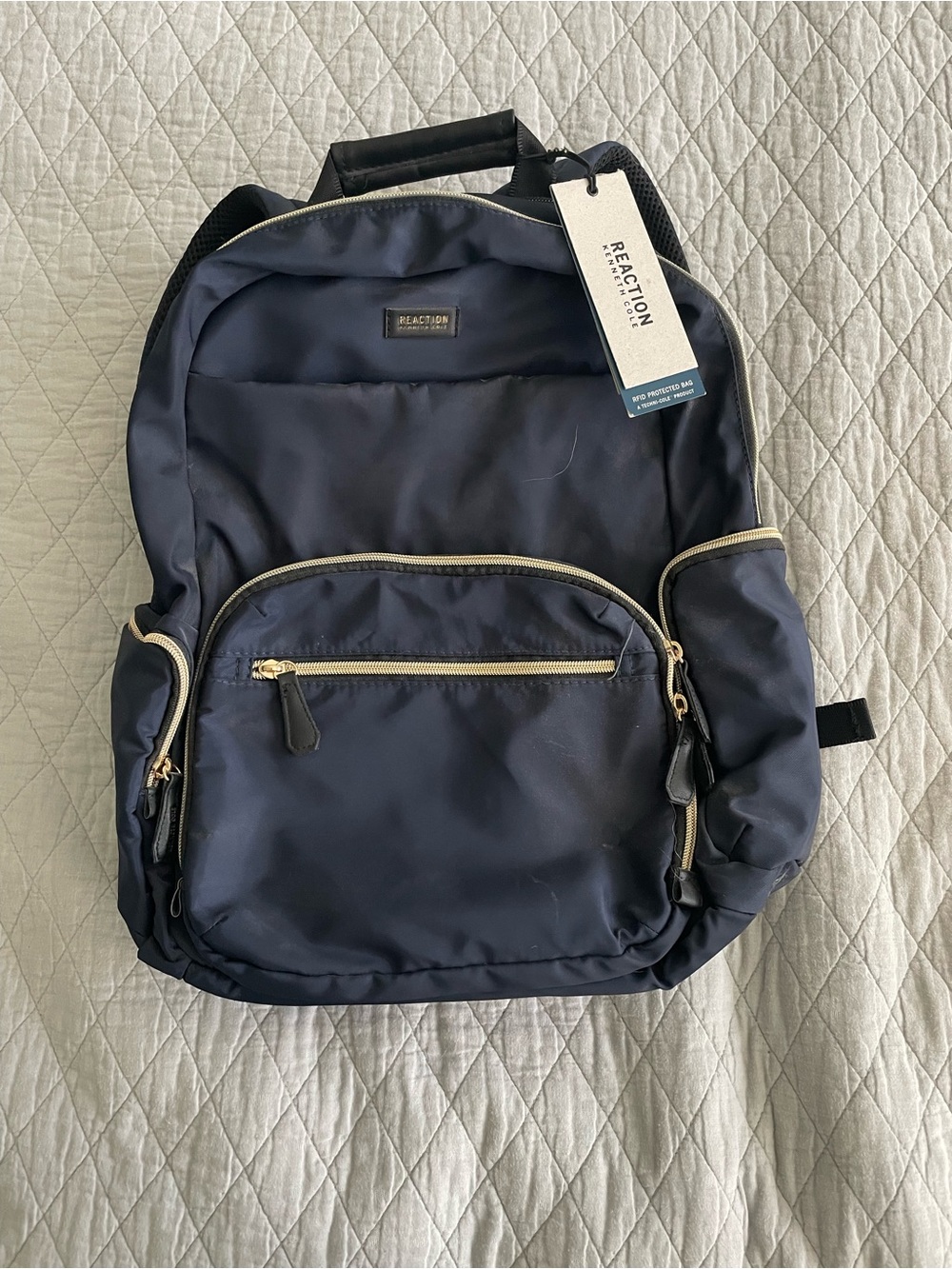 Kenneth Cole Reaction Navy Backpack with Gold Hardware